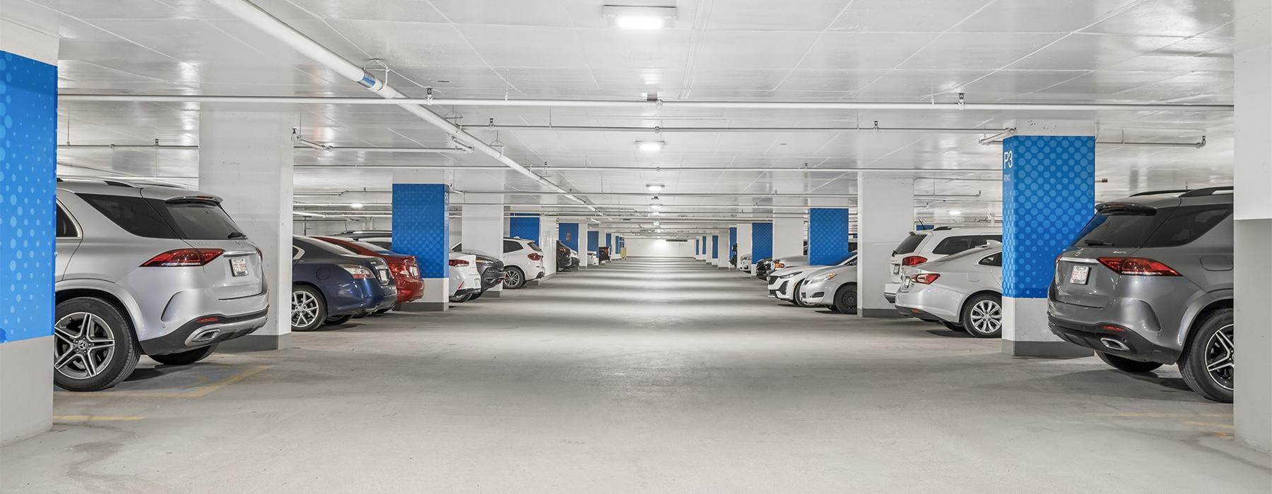 a group of cars parked in a large room
