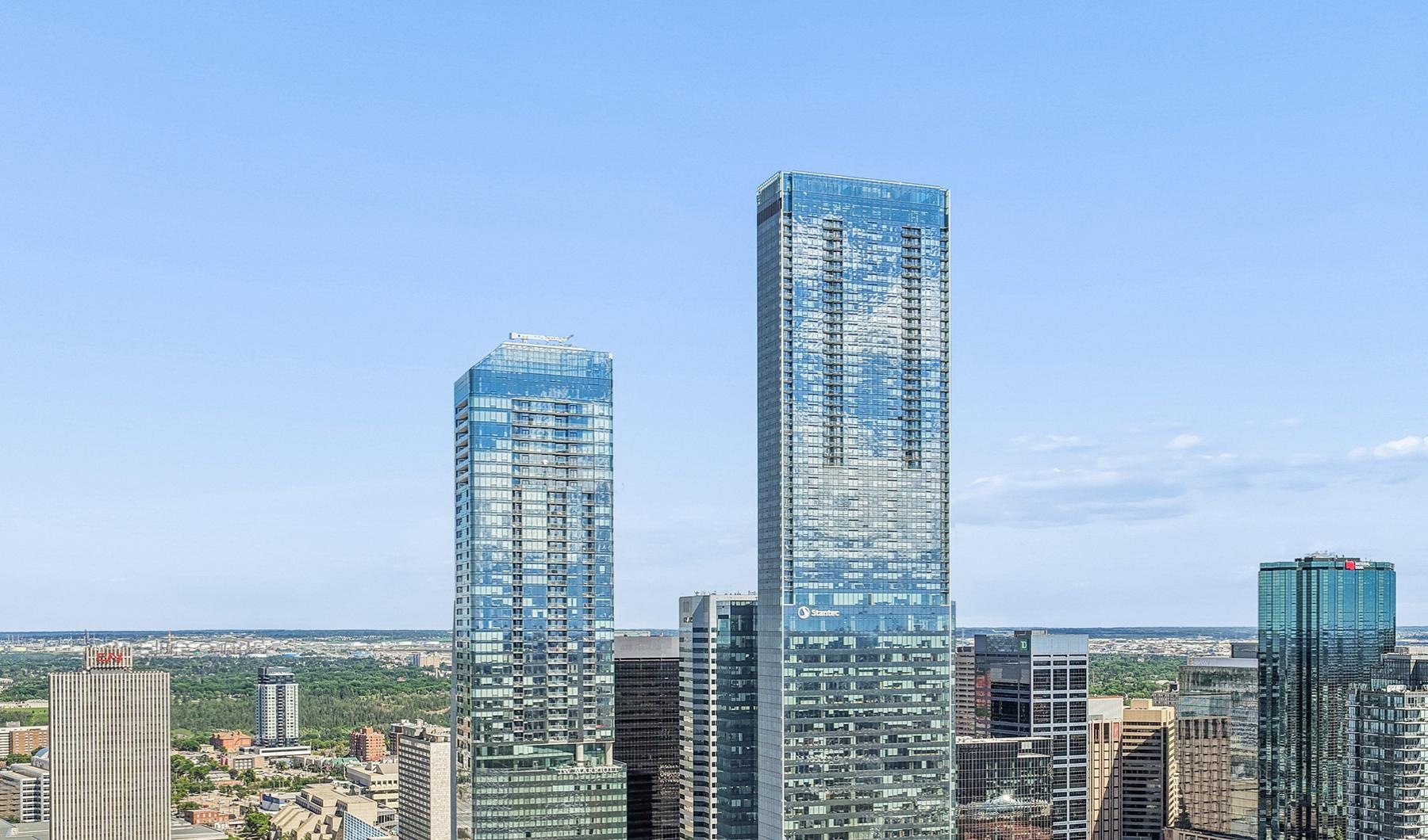 a couple of skyscrapers in a city