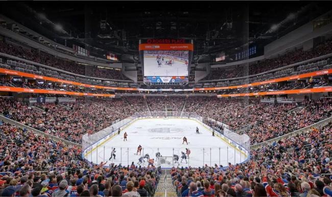 a hockey arena with a crowd
